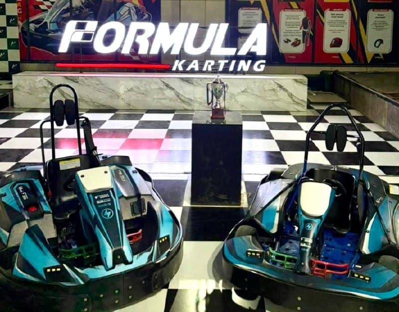 Indoor karting track with electric karts